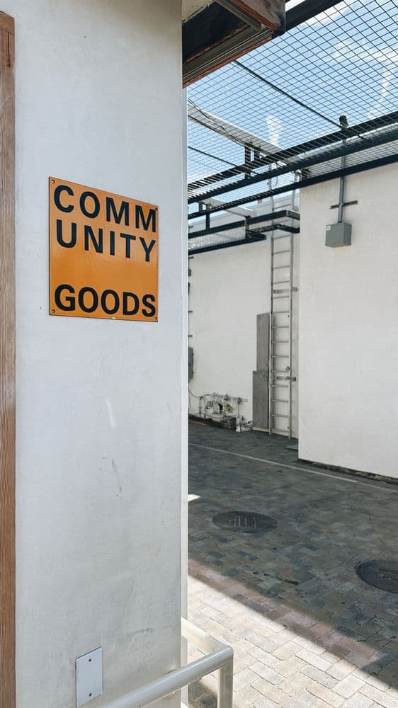 Community Goods exterior storefront with orange sign